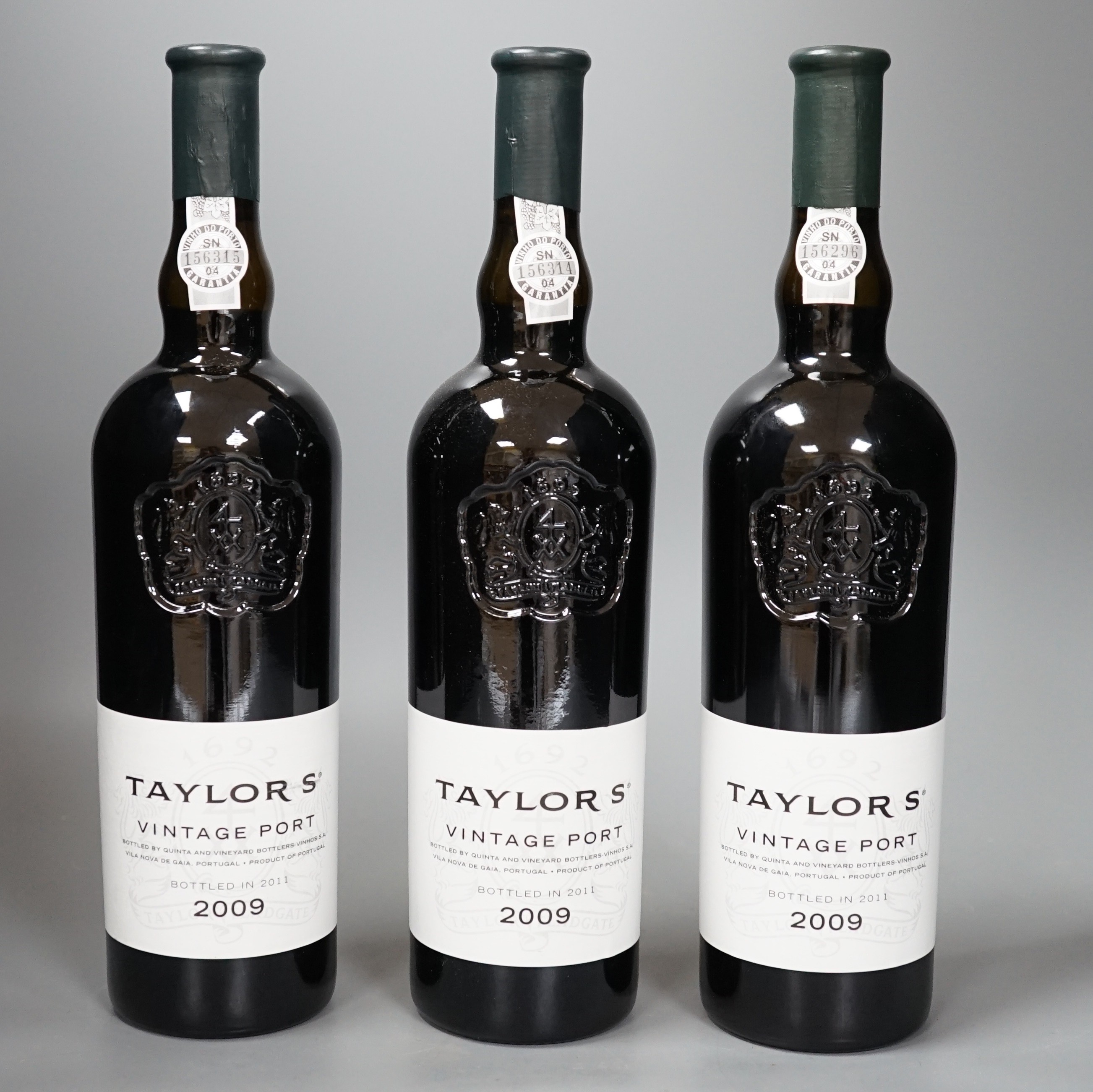 Three bottles of Taylors 2009 vintage port.